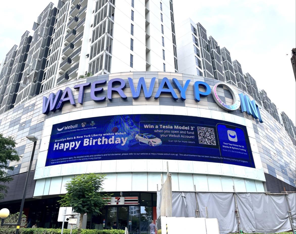 Webull birthday campaign on the Waterway Point facade screen